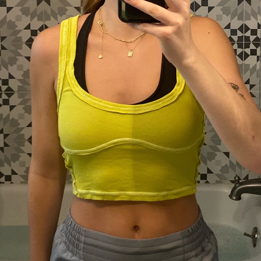 medium out from under neon top